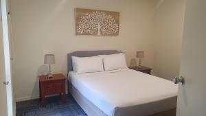 Postel nebo postele na pokoji v ubytování Hotel Cavalier