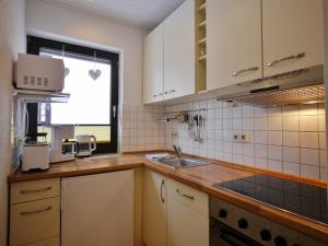 Η κουζίνα ή μικρή κουζίνα στο Ferienwohnung Nelly am Kurpark