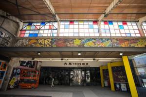 a building with a stained glass window in it at Home Inn Xi'an South Taihua Road Daming Palace Relics Park in Xi'an