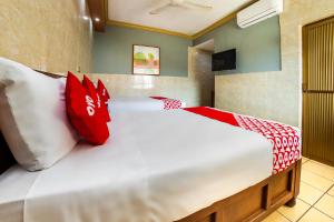 Postel nebo postele na pokoji v ubytování Hotel Romo