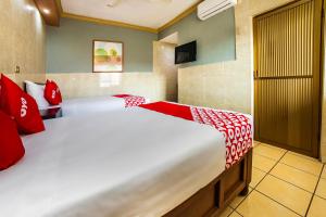 Postel nebo postele na pokoji v ubytování Hotel Romo