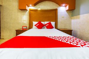 Postel nebo postele na pokoji v ubytování Hotel Romo