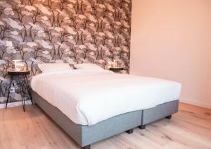Postelja oz. postelje v sobi nastanitve Smartflats - Antwerp View
