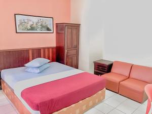 Postel nebo postele na pokoji v ubytování Hotel Aida Syariah Mitra RedDoorz + 8 fotografií