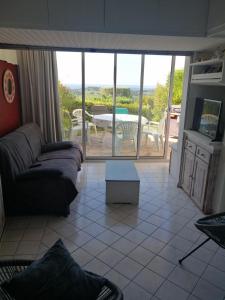 Χώρος καθιστικού στο Petit coin de paradis