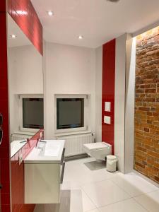 Kúpeľňa v ubytovaní Apartamenty Młyńska 4