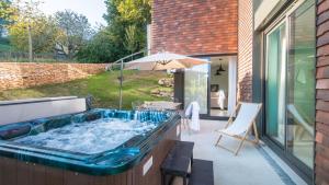 Πισίνα στο ή κοντά στο Villa Côté Ouest avec Jacuzzi Privatif