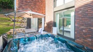 Πισίνα στο ή κοντά στο Villa Côté Ouest avec Jacuzzi Privatif