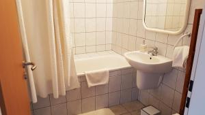 Koupelna v ubytování AAA-Apartment 2 + 23 fotografií