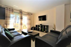 TV a/nebo společenská místnost v ubytování Apartment LONDON