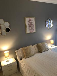 Katil atau katil-katil dalam bilik di Sun Place Guest House