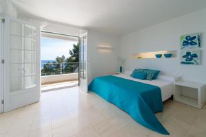 Postel nebo postele na pokoji v ubytování Villa Paraiso D14