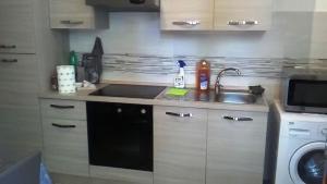 Kuchyň nebo kuchyňský kout v ubytování Edoardoapartments1
