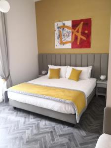 Posteľ alebo postele v izbe v ubytovaní Frattina FF italian suites
