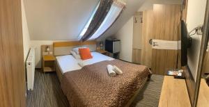 Posteľ alebo postele v izbe v ubytovaní Hotel Dolce Vita