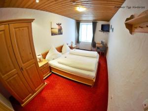 Postel nebo postele na pokoji v ubytování Gästehaus Siegllehen