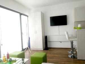 TV a/nebo společenská místnost v ubytování Apartman NINA Wind Resort