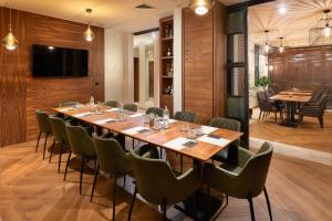 TV a/nebo společenská místnost v ubytování Time Boutique Hotel