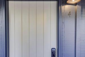 a sliding glass door with a cell phone next to it at South Lake Chalet-Boutique Suite-Minutes to Heavenly & Lake Tahoe in South Lake Tahoe