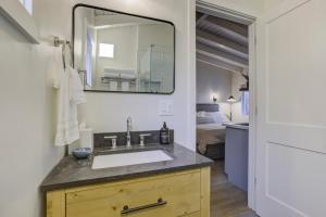 a bathroom with a sink and a mirror at South Lake Chalet-Boutique Suite-Minutes to Heavenly & Lake Tahoe in South Lake Tahoe