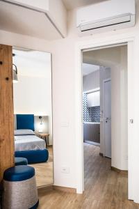 Posteľ alebo postele v izbe v ubytovaní Incao Holiday Giudecca House