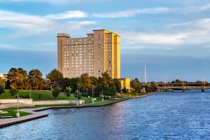 a large body of water with a large building at Hyatt Regency Wichita in Wichita