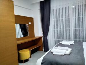 AdaHan Family Rooms Gocek客房内的一张或多张床位