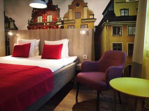 Säng eller sängar i ett rum på ProfilHotels Central