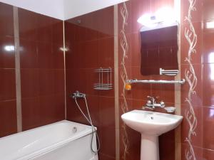 Kylpyhuone majoituspaikassa Gelov Hotel
