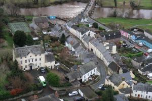 an aerial view of a small town with houses at Cosy Crickhowell Cottage in Crickhowell