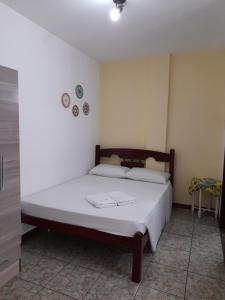 Cama o camas de una habitación en Pousada Baleia Franca Canasvieiras