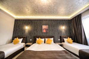 Voodi või voodid majutusasutuse Garnet Hotel & Event Centar toas