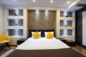Voodi või voodid majutusasutuse Garnet Hotel & Event Centar toas