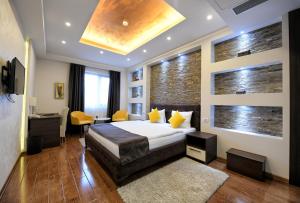 Voodi või voodid majutusasutuse Garnet Hotel & Event Centar toas
