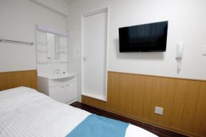 Gulta vai gultas numurā naktsmītnē Phoenix Ryukyu Henzanbaru -SEVEN Hotels and Resorts-