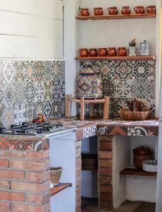 Η κουζίνα ή μικρή κουζίνα στο Pintoresca casa en la playa