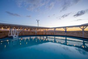 a large swimming pool on top of a building at Sunlight Retreat in Twentynine Palms