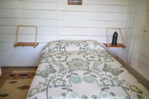 Un ou plusieurs lits dans un hébergement de l'établissement Pintoresca casa en la playa