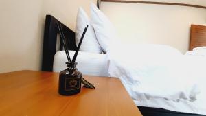 Postel nebo postele na pokoji v ubytování Sabua The Terrace Homestay
