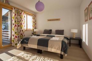 Postel nebo postele na pokoji v ubytování Ferienwohnung Gartenweg