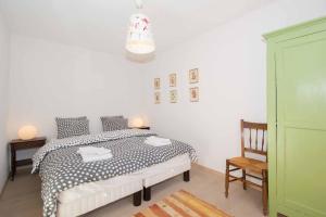 Postel nebo postele na pokoji v ubytování Ferienwohnung Gartenweg