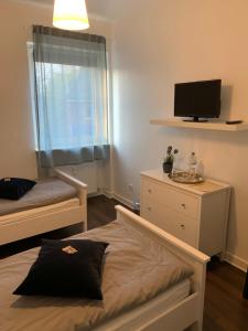 Postel nebo postele na pokoji v ubytování Zum armen Mann