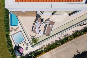 Bazén v ubytovaní Villa Elena Deluxe mit Whirlpool und beheiztem Pool am Meer und wunderschönen Blick auf die Brijuni Inseln alebo v jeho blízkosti