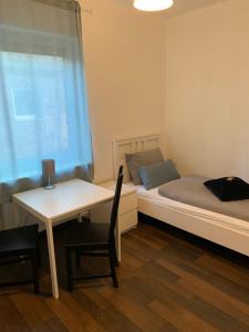 Postel nebo postele na pokoji v ubytování Zum armen Mann