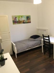 Postel nebo postele na pokoji v ubytování Zum armen Mann