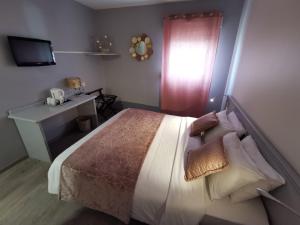 Postel nebo postele na pokoji v ubytování Hotel Ambotel