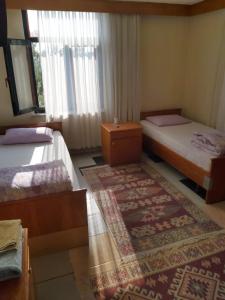 Ein Bett oder Betten in einem Zimmer der Unterkunft Hasyurt Hotel