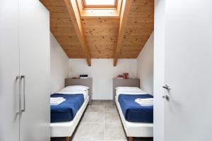 Letto o letti in una camera di Dreams Hotel Residenza Pianell 10