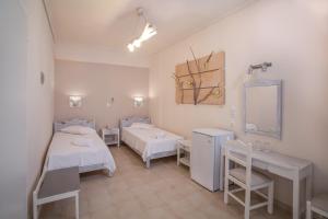 Letto o letti in una camera di Amaryllis Hotel
