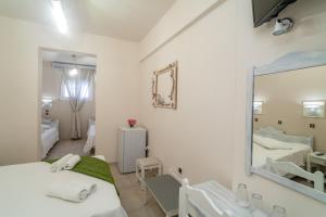 Letto o letti in una camera di Amaryllis Hotel